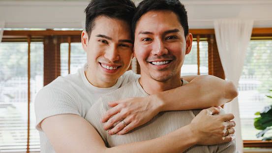 Gay male couple engaged to be married