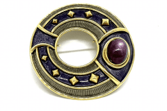 33.5 dwt 18k yellow gold, enamel and star ruby (approx 14cts) pin, signed Leo deVroomen