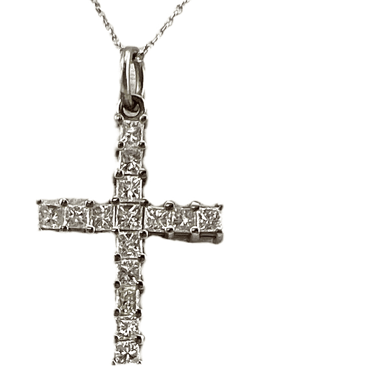 Diamond cross necklace closeup