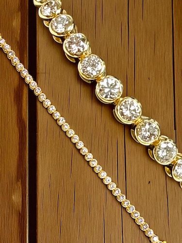 Bezel set 14k yellow gold tennis bracelet with 38 RBC diamonds @ 7.40 carats