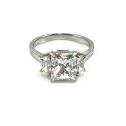 Elegant diamond engagement ring featuring a prominent square-cut center stone flanked by two smaller side stones, set in a sleek silver band. Perfect for special occasions or as a symbol of love and commitment. Rings