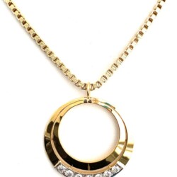 Elegant gold pendant necklace featuring a circular design with embedded diamonds, perfect for jewelry collectors and buyers. Necklaces