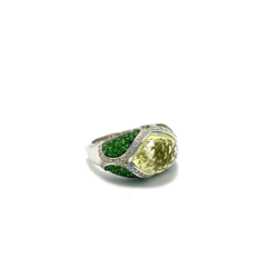 This stunning jewelry piece features a large yellow gemstone centerpiece surrounded by vibrant green accents and sparkling diamonds, perfect for collectors and jewelry enthusiasts seeking unique, high-quality estate jewelry. Rings