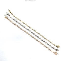 This image showcases a delicate, multi-tone beaded chain bracelet featuring gold, silver, and rose gold hues, perfect for accessorizing elegant outfits. Ideal for jewelry enthusiasts and collectors seeking versatile, stylish pieces. Bracelets
