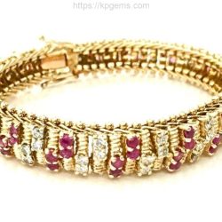 Elegant gold bracelet featuring alternating rubies and diamonds, perfect for sophisticated jewelry collections. A stunning piece that combines luxury and timeless style, ideal for special occasions or everyday elegance. Bracelets