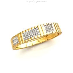 This stunning gold and diamond eternity ring features a detailed design with sparkling diamonds, ideal for those seeking elegant and timeless jewelry pieces. Bracelets