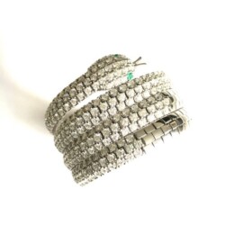 A stunning pair of diamond hoop earrings featuring multiple rows of sparkling diamonds, perfect for adding a touch of luxury to any outfit. Crafted with high-quality materials, these earrings are a timeless addition to any jewelry collection. Bracelets