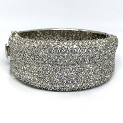 A stunning, luxurious bracelet adorned with numerous sparkling diamonds, perfect for elegant occasions and showcasing exquisite craftsmanship. This piece is a beautiful example of fine jewelry available at our estate jewelry gallery. Bracelets