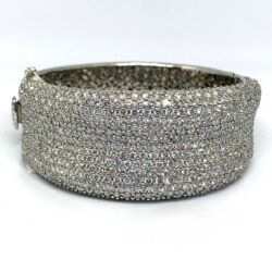 A stunning, luxurious bracelet adorned with numerous sparkling diamonds, perfect for elegant occasions and showcasing exquisite craftsmanship. This piece is a beautiful example of fine jewelry available at our estate jewelry gallery. Bracelets